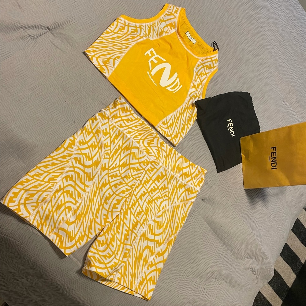 BRAND NEW! Yellow Fendi cycle set. Includes cropped tank and matching shorts